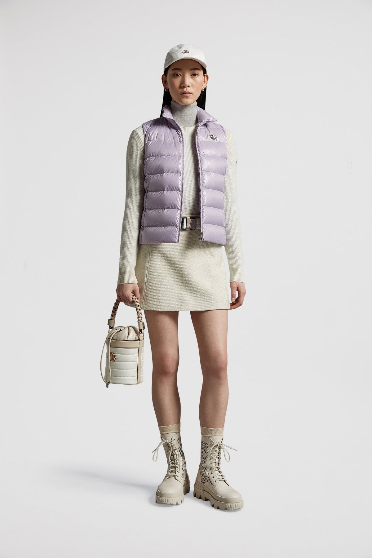 Ghany Down Classic Vest – the Ghany vest for women revisits the archives and draws inspiration from iconic – LUX VERSE Luxury Designer Fashion Outlet