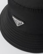 Re-Nylon bucket hat – this bucket hat, an iconic accessory of collections, is made of Re-Nylon: – LUX VERSE Luxury Designer Fashion Outlet