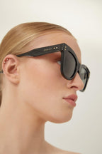 Cat-eye black sunglasses – close your eyes and drift back in time…you’re in Piazza del Popolo in Rome, it’s – LUX VERSE Luxury Designer Fashion Outlet
