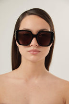 GG0956S oversized black sunglasses with maxi logo – pared-back simplicity characterises the essential shapes, lines and colours of this – LUX VERSE Luxury Designer Fashion Outlet