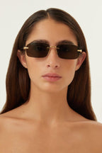 Micro rimless metal sunglasses – the integrated logo is framed by a series of details and becomes part of – LUX VERSE Luxury Designer Fashion Outlet
