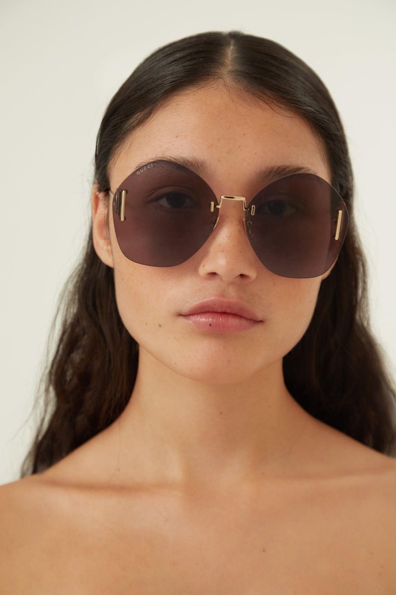 Overzized rimless sunglasses – oversize geometrical rimless style featuring metal temples presenting – LUX VERSE Luxury Designer Fashion Outlet