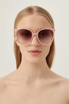 Pink cat-eye sunglasses – it features a metal rim on the front – LUX VERSE Luxury Designer Fashion Outlet