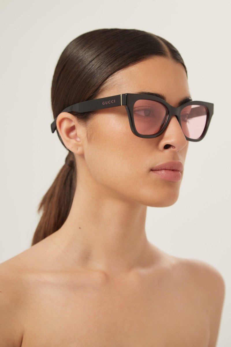 Soft cat-eye black and pink sunglasses – the cat-eye yet bold shape is enriched by the Lettering logo on both temples – LUX VERSE Luxury Designer Fashion Outlet