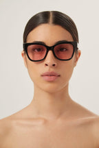 Soft cat-eye black and pink sunglasses – simplicity, attention to detail and a discreet logo, just like a high-end jacket – LUX VERSE Luxury Designer Fashion Outlet