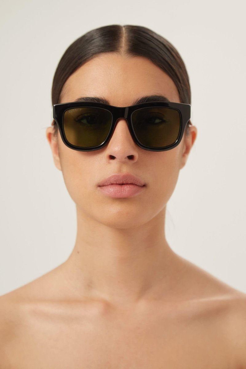 Soft squared black and green sunglasses – the cat-eye yet bold shape is enriched by the Lettering logo on both temples – LUX VERSE Luxury Designer Fashion Outlet
