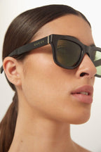 Soft squared black and green sunglasses – the style is even more cool thanks to the matchy colors of the logo and the lenses – LUX VERSE Luxury Designer Fashion Outlet