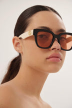 Squared femenine black and ivory sunglasses – feminine squared shape in acetate chacacterized by bold volumes and strong – LUX VERSE Luxury Designer Fashion Outlet