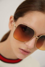 Squared metal gold brown classic sunglasses with horsebit detail – the Logo is featured with the same refined feeling as the fashion house does for – LUX VERSE Luxury Designer Fashion Outlet