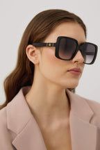 Squared oversized femenine black sunglasses – the interlocking logo on temples framed by two gold-coloured bars – LUX VERSE Luxury Designer Fashion Outlet