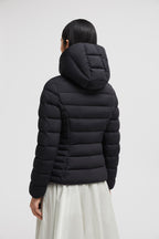Herbe Short Down Jacket – a hood with shiny logo lettering adds another hint of brand DNA to the puffer jacket – LUX VERSE Luxury Designer Fashion Outlet