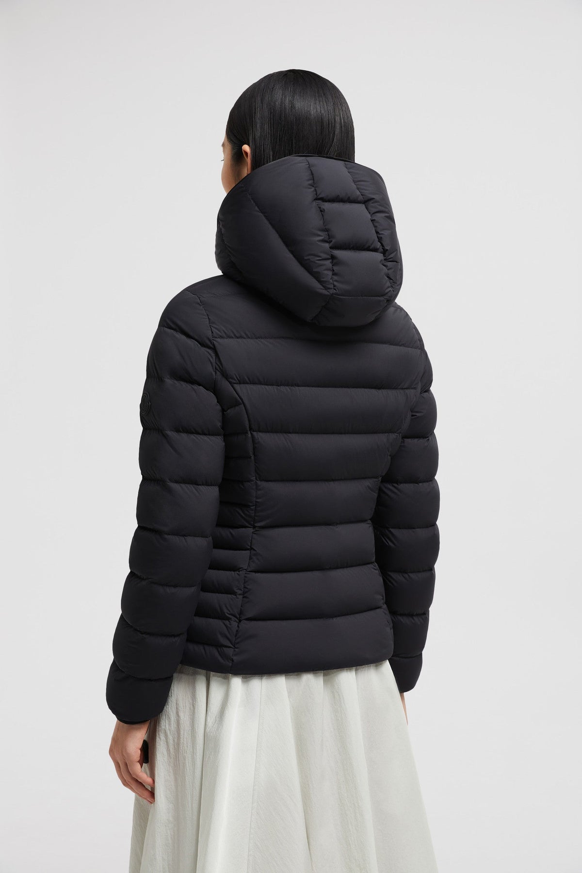 Herbe Short Down Jacket – a hood with shiny logo lettering adds another hint of brand DNA to the puffer jacket – LUX VERSE Luxury Designer Fashion Outlet