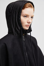 Hooded Down Cape – perfect for layering over other lighter pieces, the design is down-filled and boasts – LUX VERSE Luxury Designer Fashion Outlet