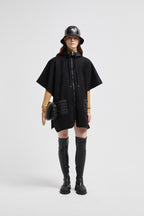 Hooded Down Cape – perfect for layering over other lighter pieces, the design is down-filled and boasts – LUX VERSE Luxury Designer Fashion Outlet