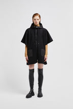 Hooded Down Cape – crafted from wool cloth Nylon hood and pocket Down-filled Zipper closure – LUX VERSE Luxury Designer Fashion Outlet