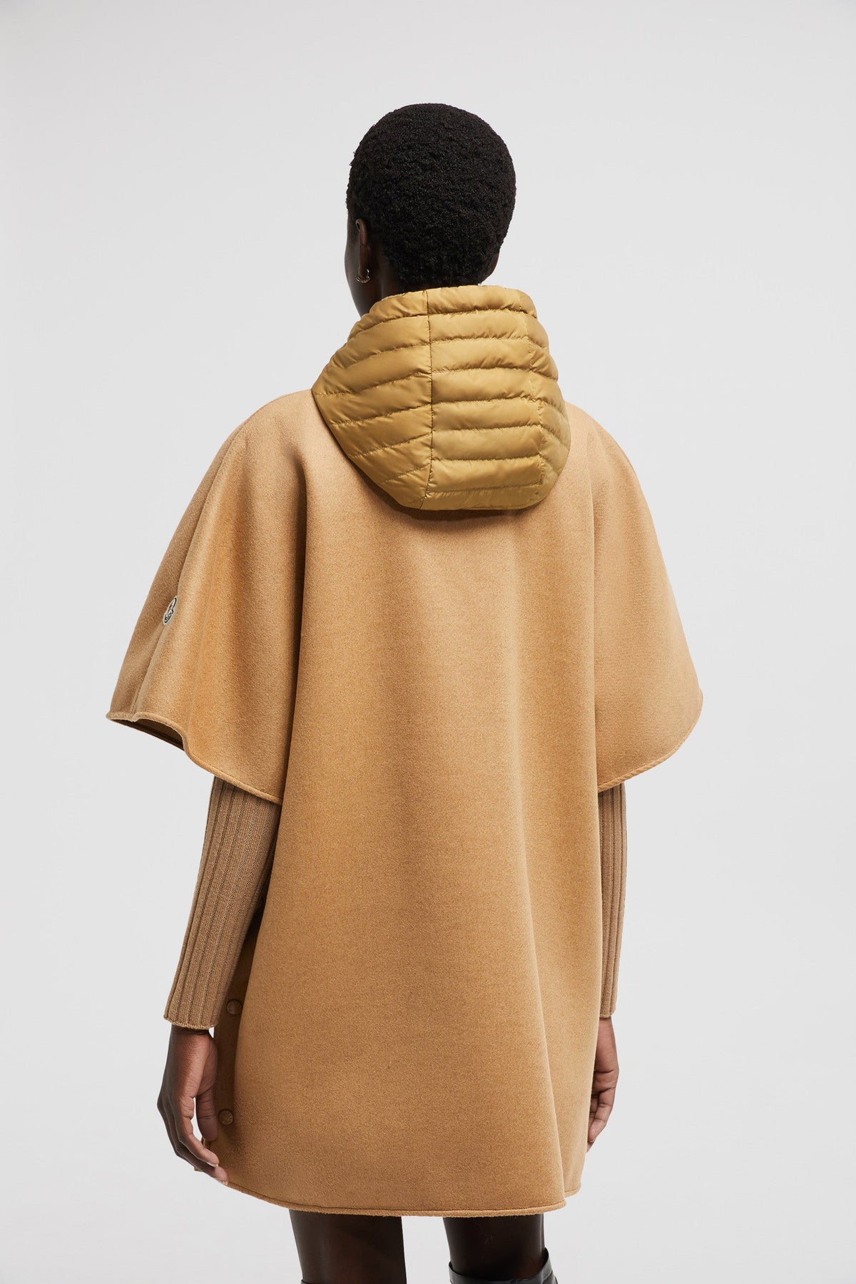 Hooded Down Cape – perfect for layering over other lighter pieces, the design is down-filled and boasts – LUX VERSE Luxury Designer Fashion Outlet