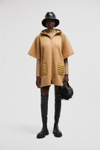 Hooded Down Cape – crafted from wool cloth Nylon hood and pocket Down-filled Zipper closure – LUX VERSE Luxury Designer Fashion Outlet