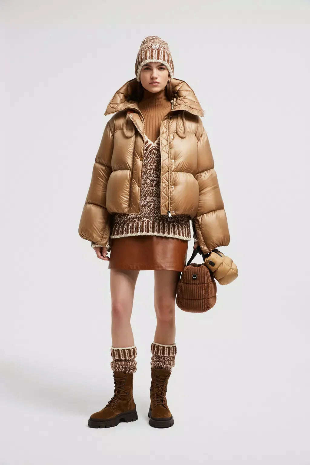 Borey Short Down Jacket – the short puffer boasts adjustable sleeves that open, allowing it to be worn as – LUX VERSE Luxury Designer Fashion Outlet