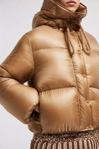 Borey Short Down Jacket – the short puffer boasts adjustable sleeves that open, allowing it to be worn as – LUX VERSE Luxury Designer Fashion Outlet