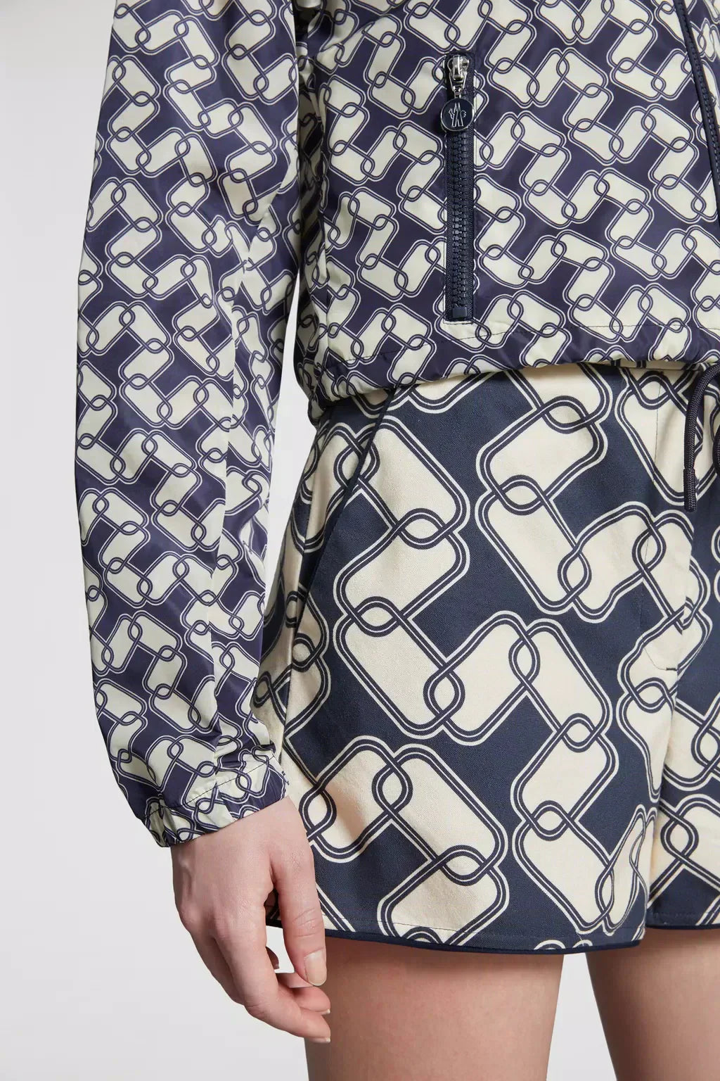 Marpessa Hooded Jacket – the long puffer boasts a hood and a nylon trim for added protection from the elements – LUX VERSE Luxury Designer Fashion Outlet