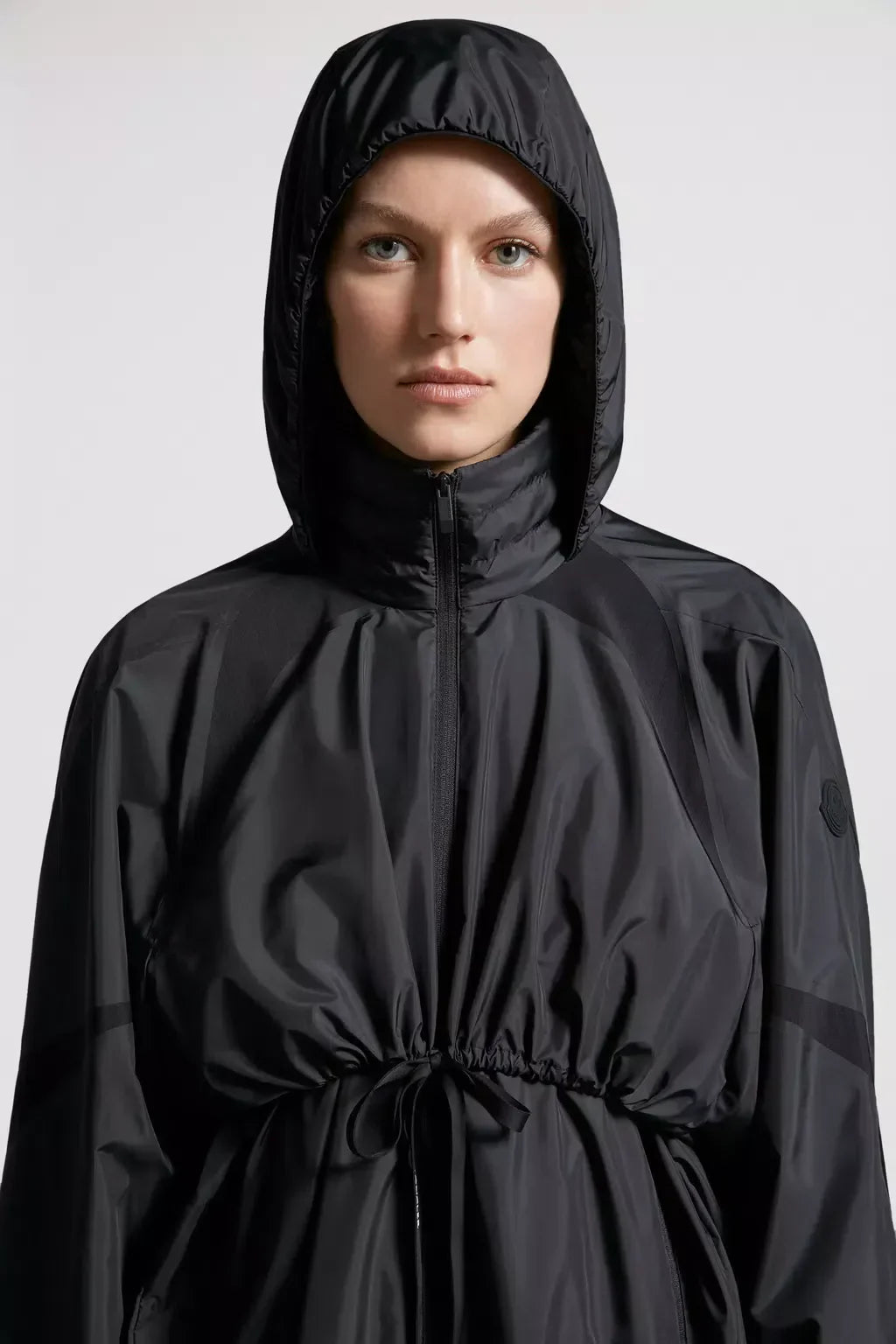Licasto Rain Coat – exemplary of forward-thinking womenswear cut from performance-oriented fabrics, – LUX VERSE Luxury Designer Fashion Outlet