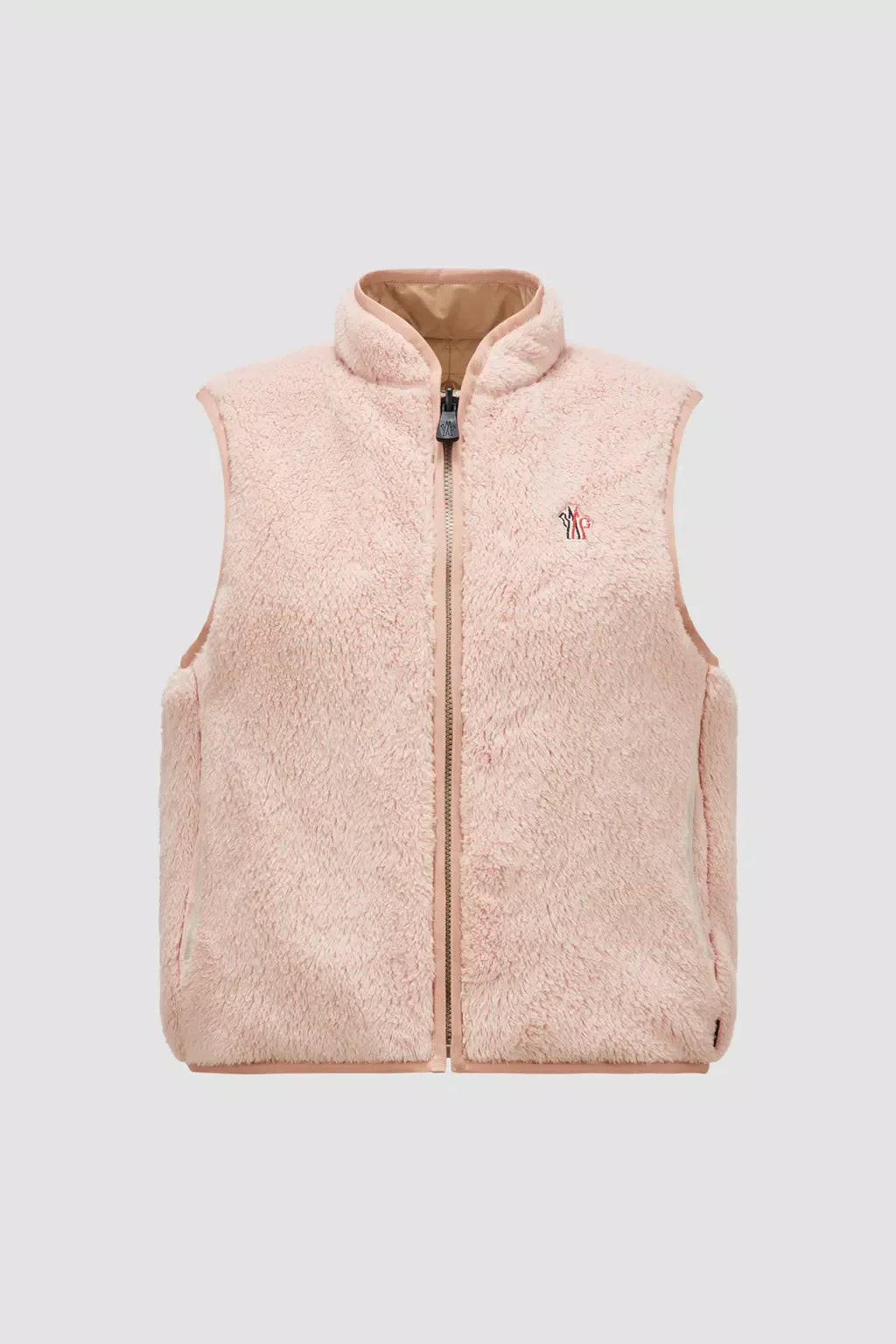 Reversible Vest – profoundly practical, this vest is crafted from Polartec, a soft fleece that – LUX VERSE Luxury Designer Fashion Outlet