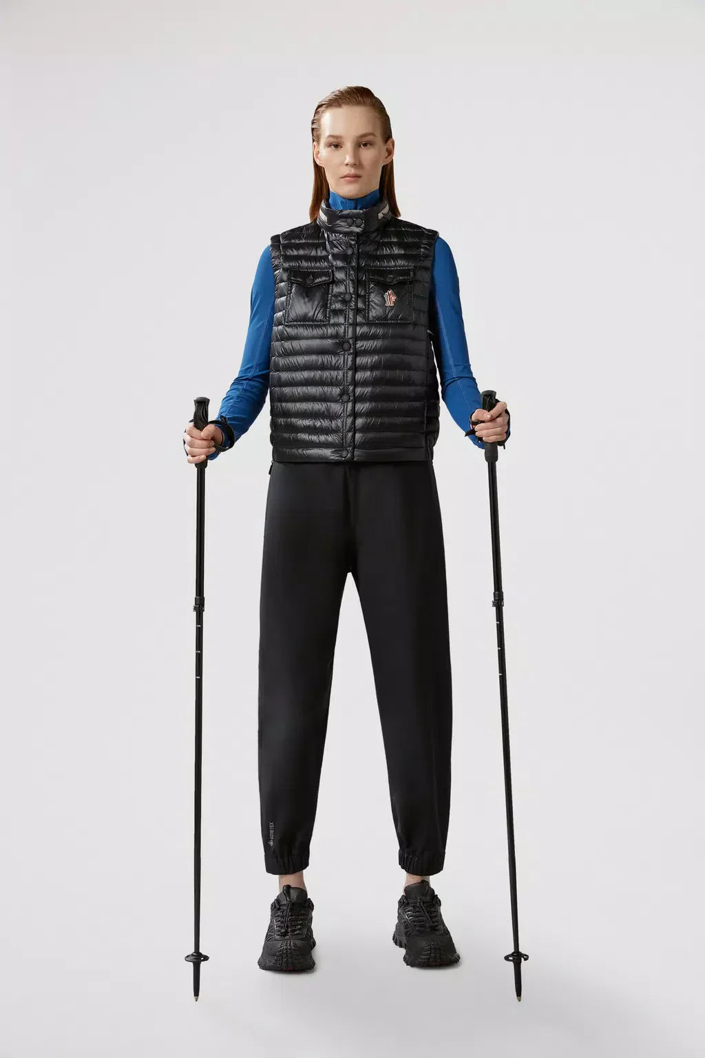 Gumiane Down Vest – the lightweight warmer is finished with a pull-pout hood and reflective details – LUX VERSE Luxury Designer Fashion Outlet