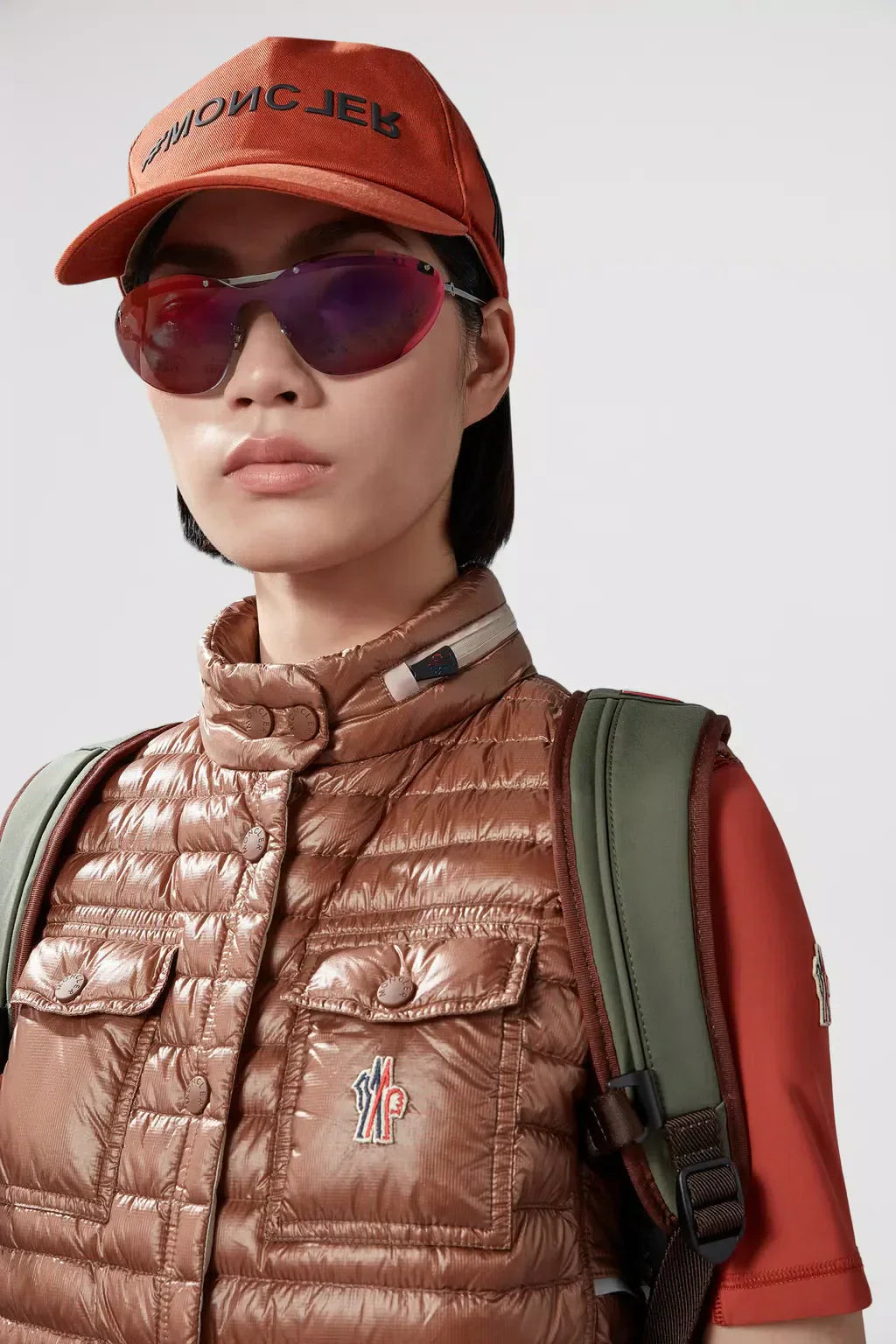Gumiane Down Vest – the lightweight warmer is finished with a pull-pout hood and reflective details – LUX VERSE Luxury Designer Fashion Outlet