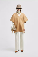 Wool & Nylon Cape – crafted from wool and nylon blend Snap button closure – LUX VERSE Luxury Designer Fashion Outlet