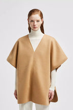 Wool & Nylon Cape – the accessory features a V-neck silhouette, adding a feminine note to the design – LUX VERSE Luxury Designer Fashion Outlet