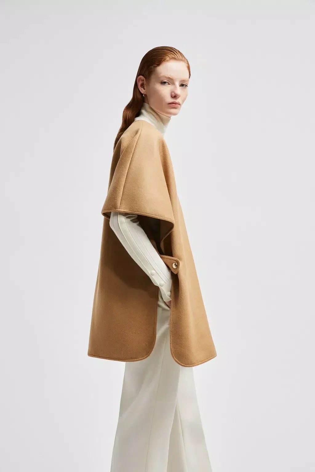 Wool & Nylon Cape – the accessory features a V-neck silhouette, adding a feminine note to the design – LUX VERSE Luxury Designer Fashion Outlet