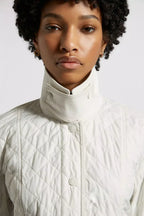 Galene Padded Jacket – featured in a palette of elevated neutrals, the wadded jacket layers well over – LUX VERSE Luxury Designer Fashion Outlet