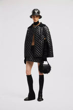 Down Cape – easily worn alone in milder weather or layered over light jackets, this cape is – LUX VERSE Luxury Designer Fashion Outlet