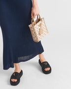 Crochet flatform slides – a simple yet sophisticated crochet pattern enhances the design of these flatform – LUX VERSE Luxury Designer Fashion Outlet