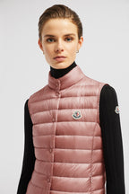Liane Vest – it is characterized by a high neck and a subtle logo patch on the chest – LUX VERSE Luxury Designer Fashion Outlet
