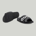 Men's slide sandal – this pair of men's slide sandal is crafted in black leather and defined by – LUX VERSE Luxury Designer Fashion Outlet