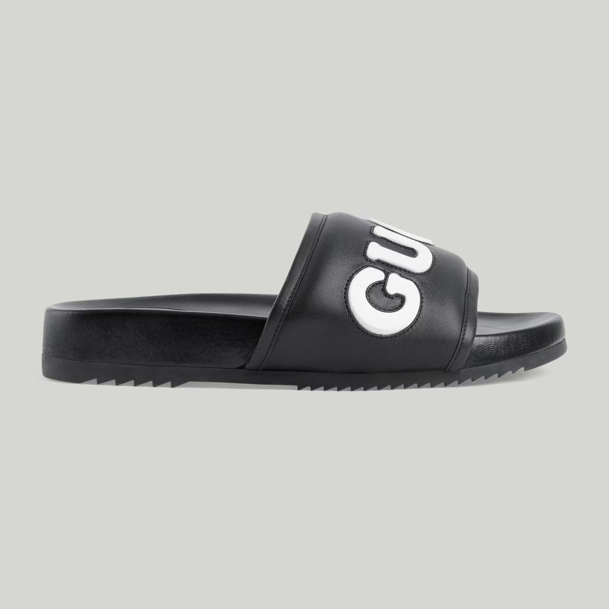 Men's slide sandal – this pair of men's slide sandal is crafted in black leather and defined by – LUX VERSE Luxury Designer Fashion Outlet