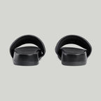 Men's slide sandal – this pair of men's slide sandal is crafted in black leather and defined by – LUX VERSE Luxury Designer Fashion Outlet