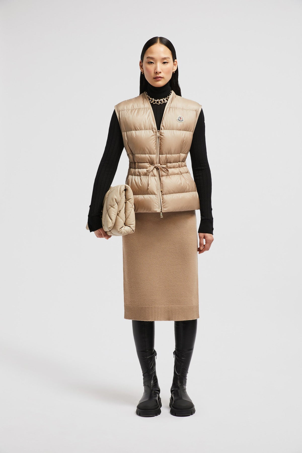Nai Down Vest – the versatile puffer vest is crafted from longue saison and features a drawstring – LUX VERSE Luxury Designer Fashion Outlet