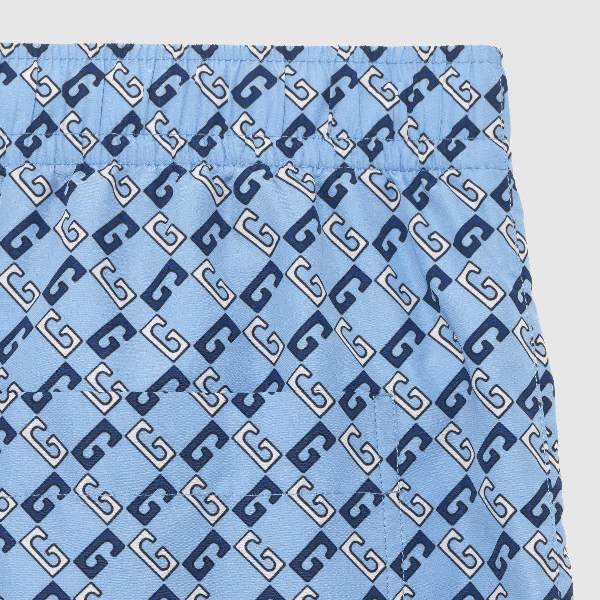 Nylon printed swim shorts – these swim shorts are crafted from light blue and blue nylon feature a Geometric – LUX VERSE Luxury Designer Fashion Outlet