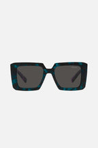 Squared colored sunglasses featuring the signature logo triangle – of silhouettes and colors: from the refined CinŽma styles to square – LUX VERSE Luxury Designer Fashion Outlet