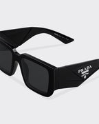 Symbole sunglasses – the frame is characterized by thick lenses that highlight the sophisticated enameled – LUX VERSE Luxury Designer Fashion Outlet