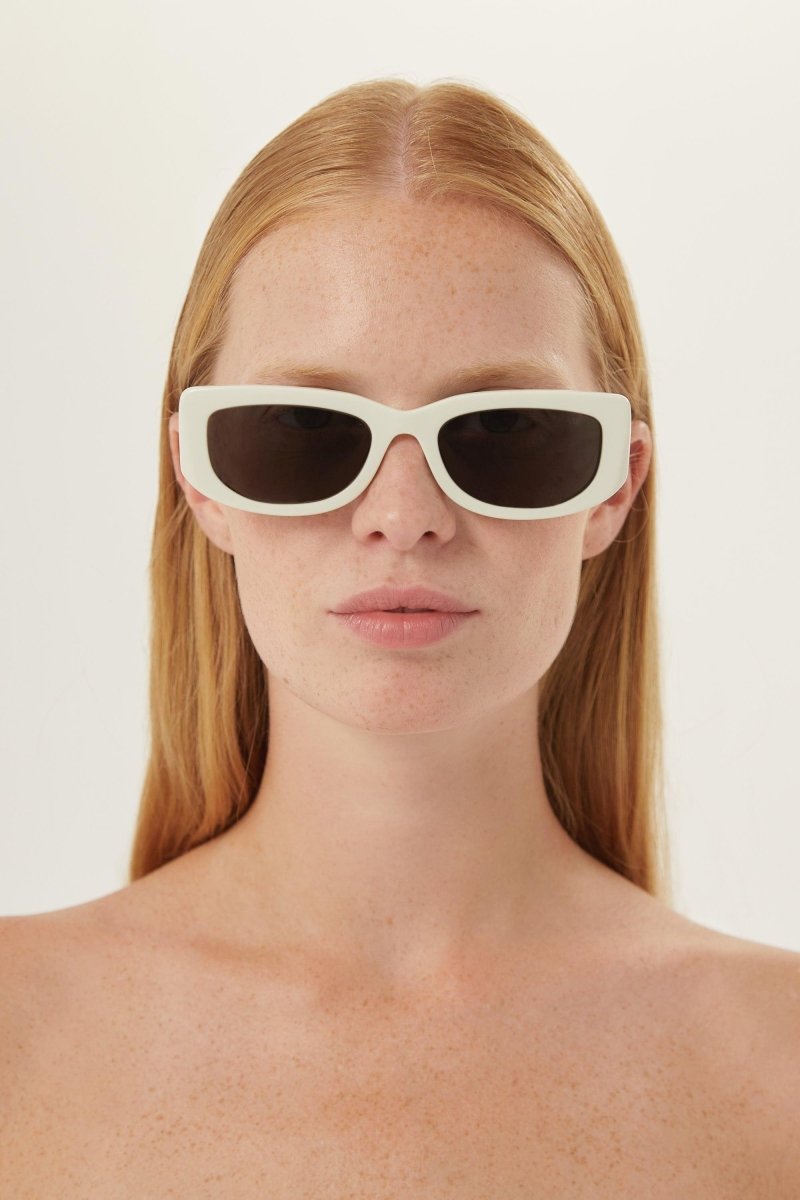 White micro sunglasses with metal temple – of silhouettes and colors: from the refined CinŽma styles to square – LUX VERSE Luxury Designer Fashion Outlet