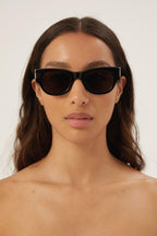 Bold oval black sunglasses – tHE STYLE IS ENRICHED BY THE BIGGEST CORNER ANGLE EVER, 1 CM,PAIRED WITH THE METAL – LUX VERSE Luxury Designer Fashion Outlet