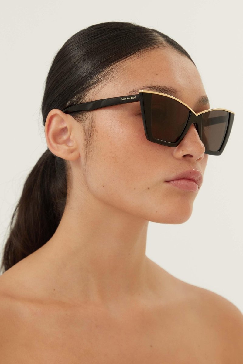 Cat eye black and gold sunglasses – a METAL TOP BAR ENRICHES THE FRAME BY GIVING AN ACCENT TO THE FEMININE SHAPE – LUX VERSE Luxury Designer Fashion Outlet