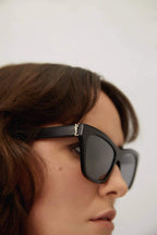 Cat-eye black sunglasses featuring YSL logo – characterized by the iconic YSL monogram logo positioned oon the hinge – LUX VERSE Luxury Designer Fashion Outlet