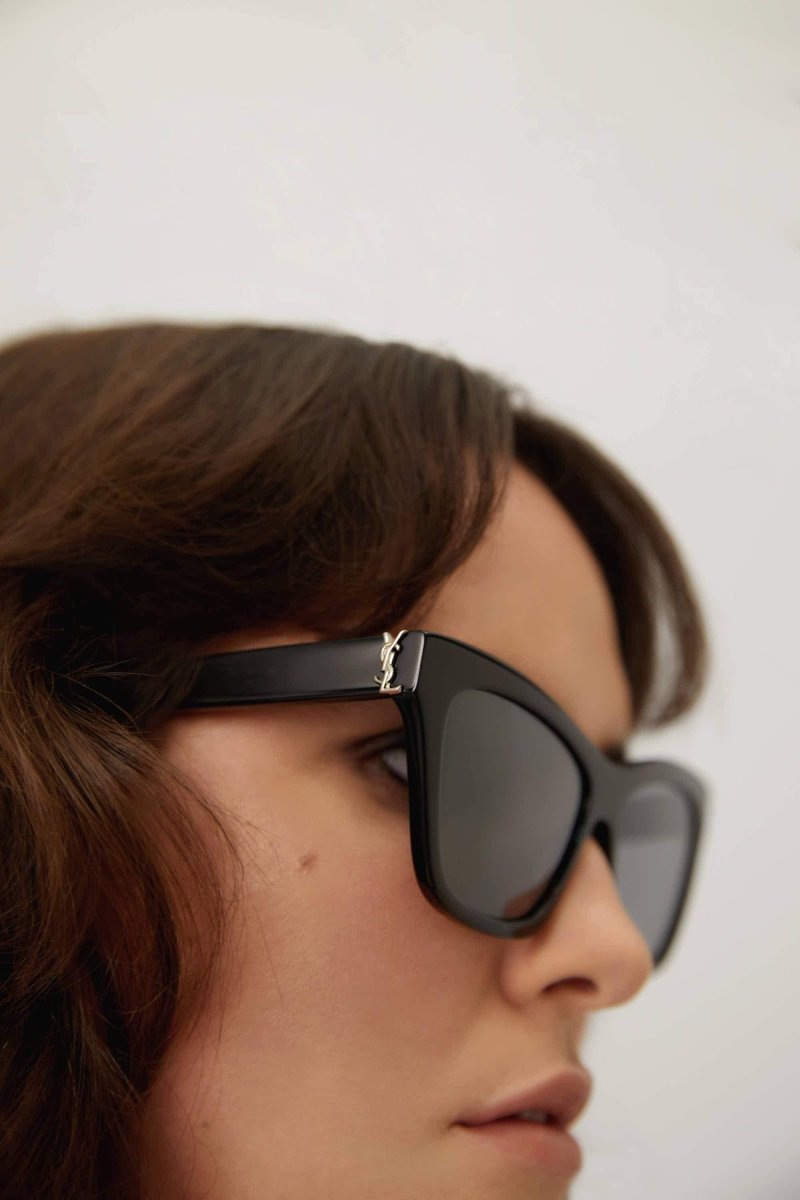 Cat-eye black sunglasses featuring YSL logo – characterized by the iconic YSL monogram logo positioned oon the hinge – LUX VERSE Luxury Designer Fashion Outlet