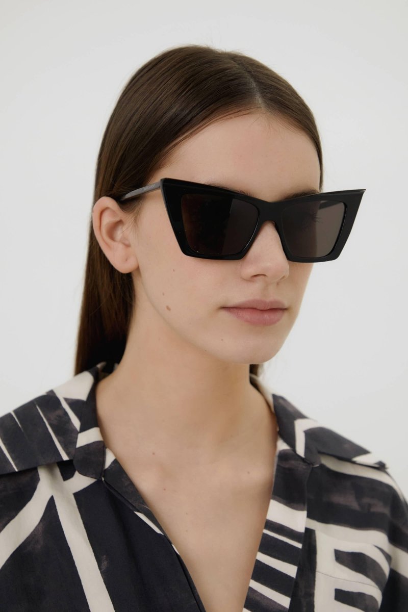 Iconic sharp cat-eye black sunglasses – iconic cata-eye style in classic black featuring a front spoiler – LUX VERSE Luxury Designer Fashion Outlet