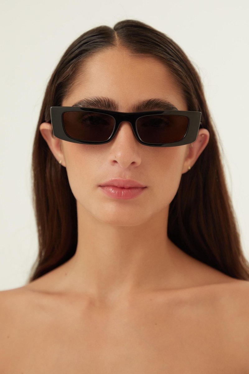 Rectangular black sunglasses – a ULTRA NARROW STYLE CHARACTERIZED BY A PLAY OF VOLUMES THROUGHOUT FRONT AND TEMPLES – LUX VERSE Luxury Designer Fashion Outlet