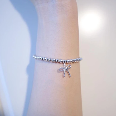 STERLING SILVER BOW BEAD BRACELET - LUX VERSE - Luxury designer fashion outlet